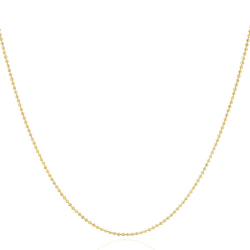 A delicate yellow gold beaded chain necklace, shown draped in a U-shape against a solid white background.