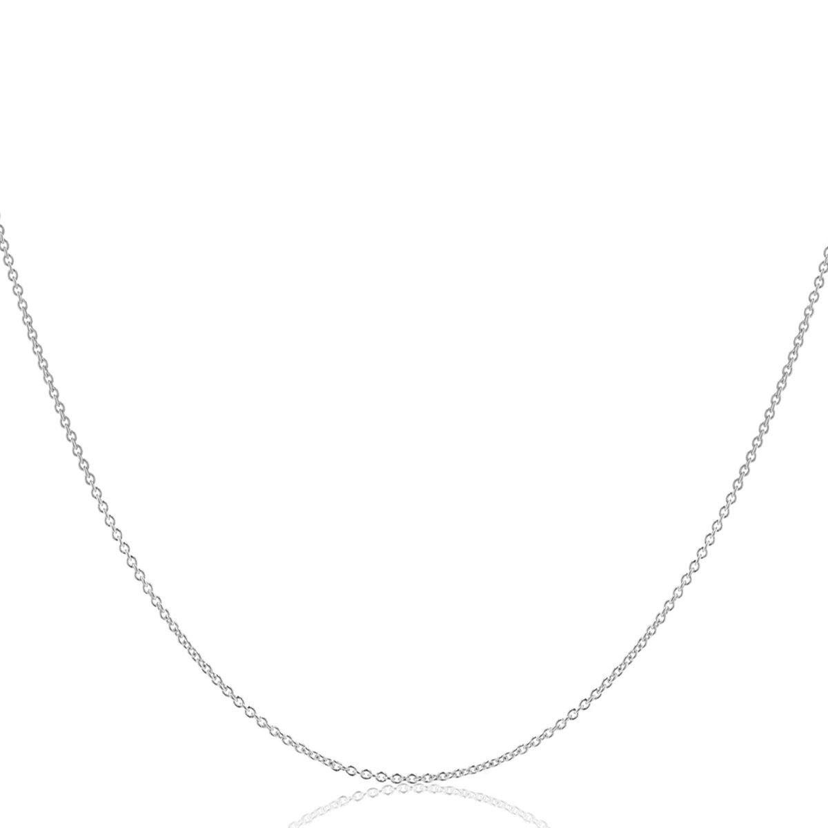 A delicate silver chain necklace shown against a plain white background, curving in a U-shape with a faint reflection below.