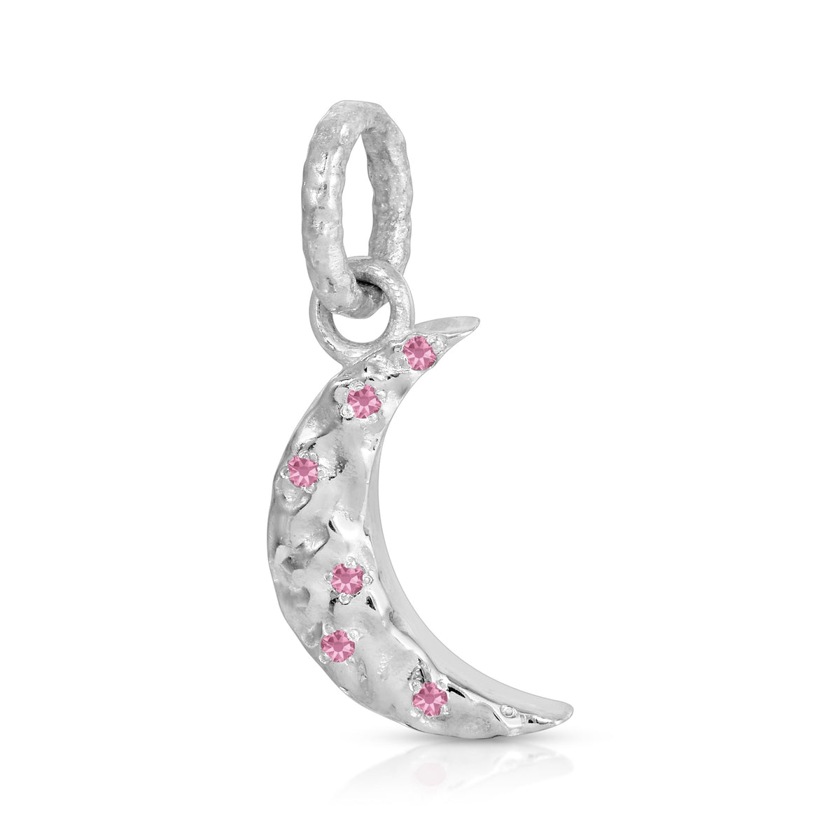 A silver crescent moon charm pendant adorned with small pink gemstones, shown on a clean white background.