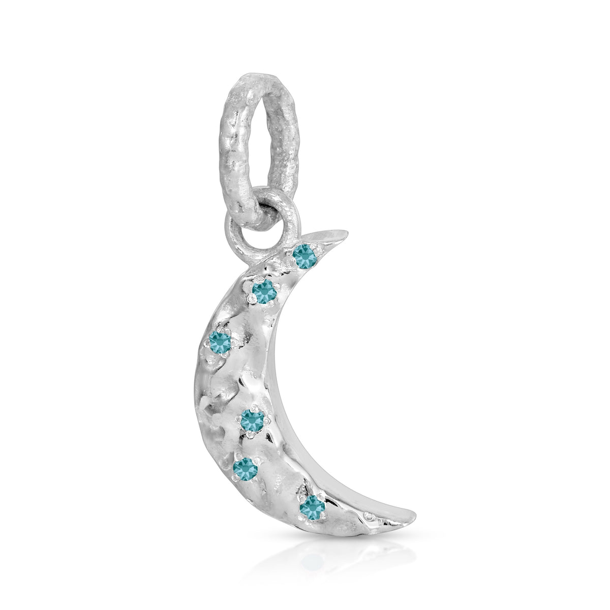 A silver crescent moon charm pendant decorated with small light blue gemstones, shown on a clean white background.