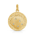 A gold shell-shaped pendant charm with a textured surface and five small light blue gemstones, shown on a clean white background.