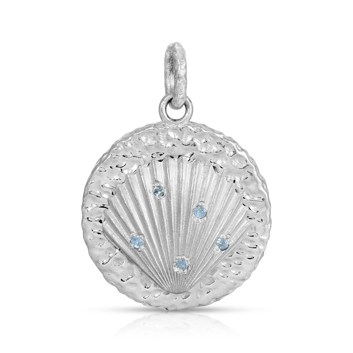 A round sterling silver shell pendant charm with a textured, hammered finish and five small light blue gemstone accents, shown on a clean white background.